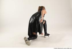 Naty BATGIRL KNEELING POSE